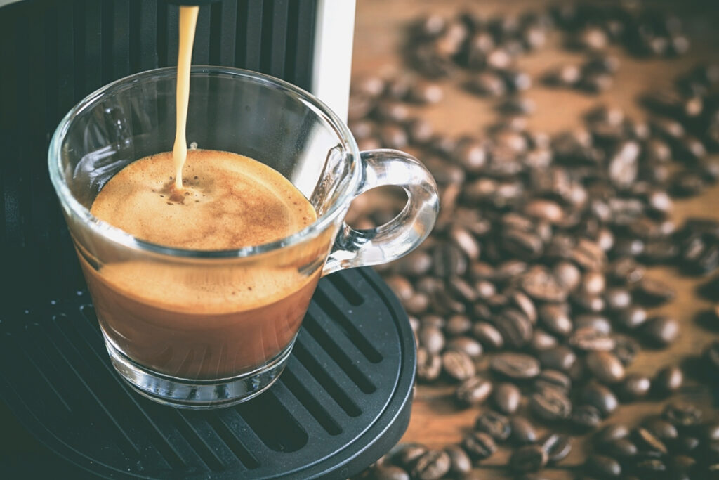 Espresso being brewed by a Nespresso machine.  