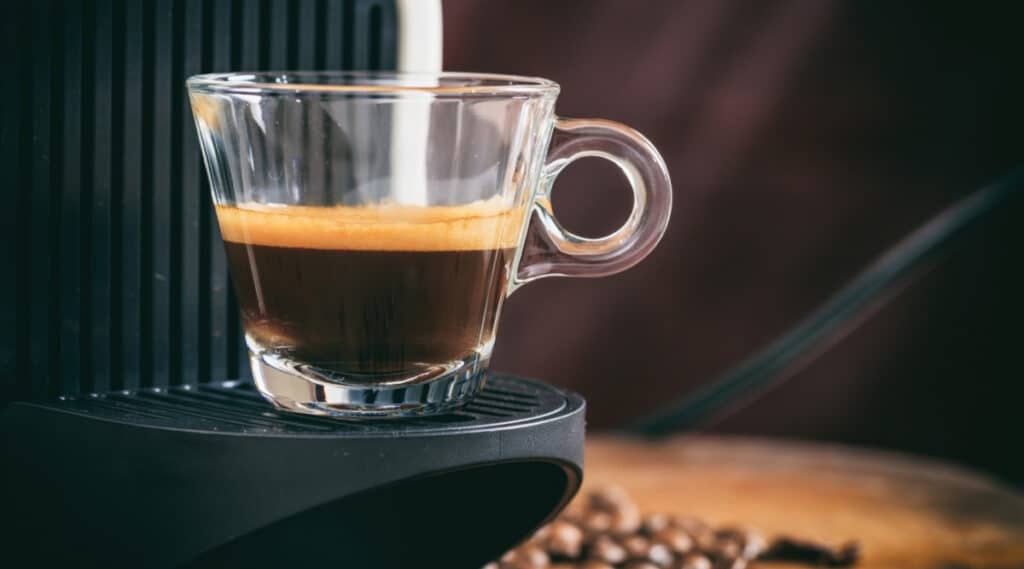 Espresso machine brewing rich flavorful espresso. 