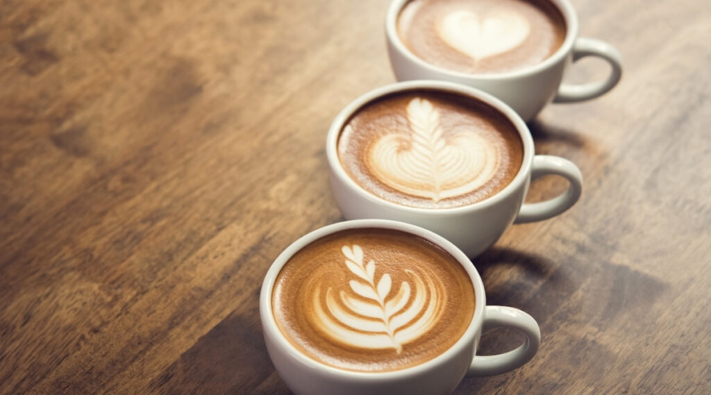 Espresso with latte art designs made from microfoam.