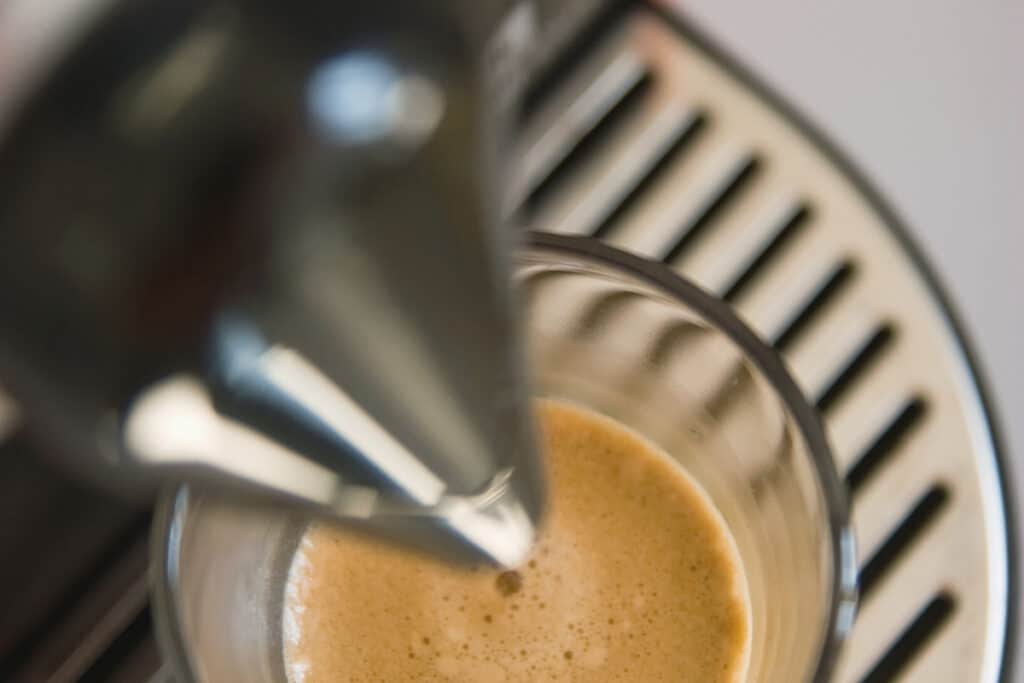 Nespresso machine brewing espresso.