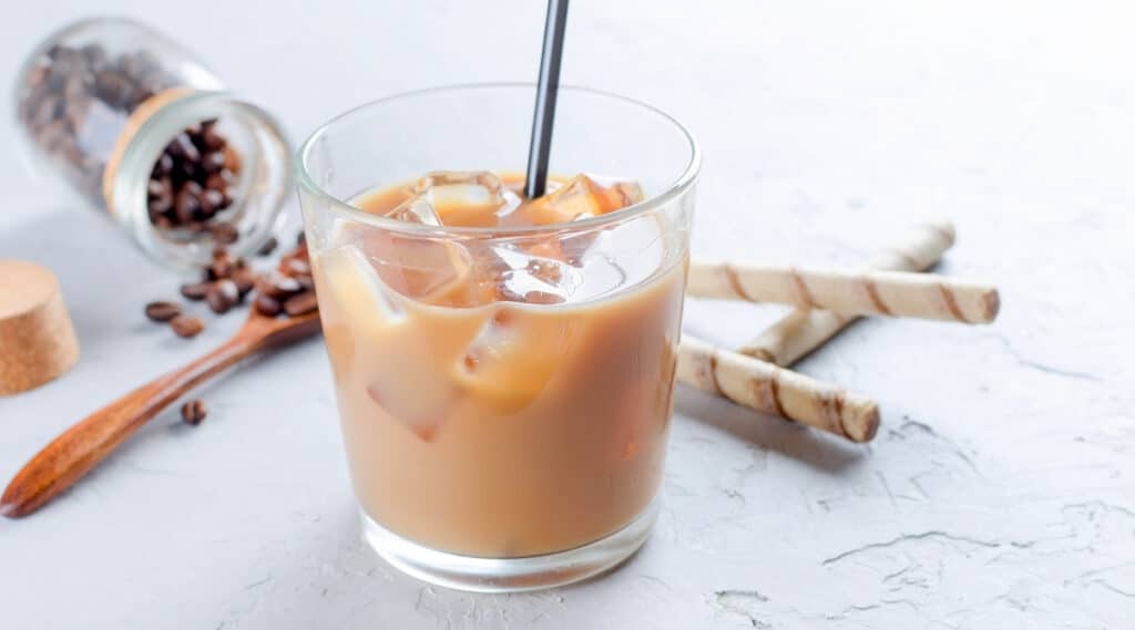Freshly brewed iced coffee in a cup.