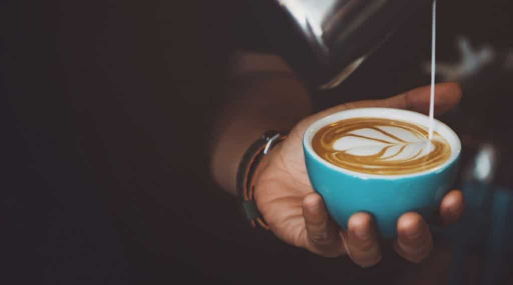 A hot latte with latte art. 